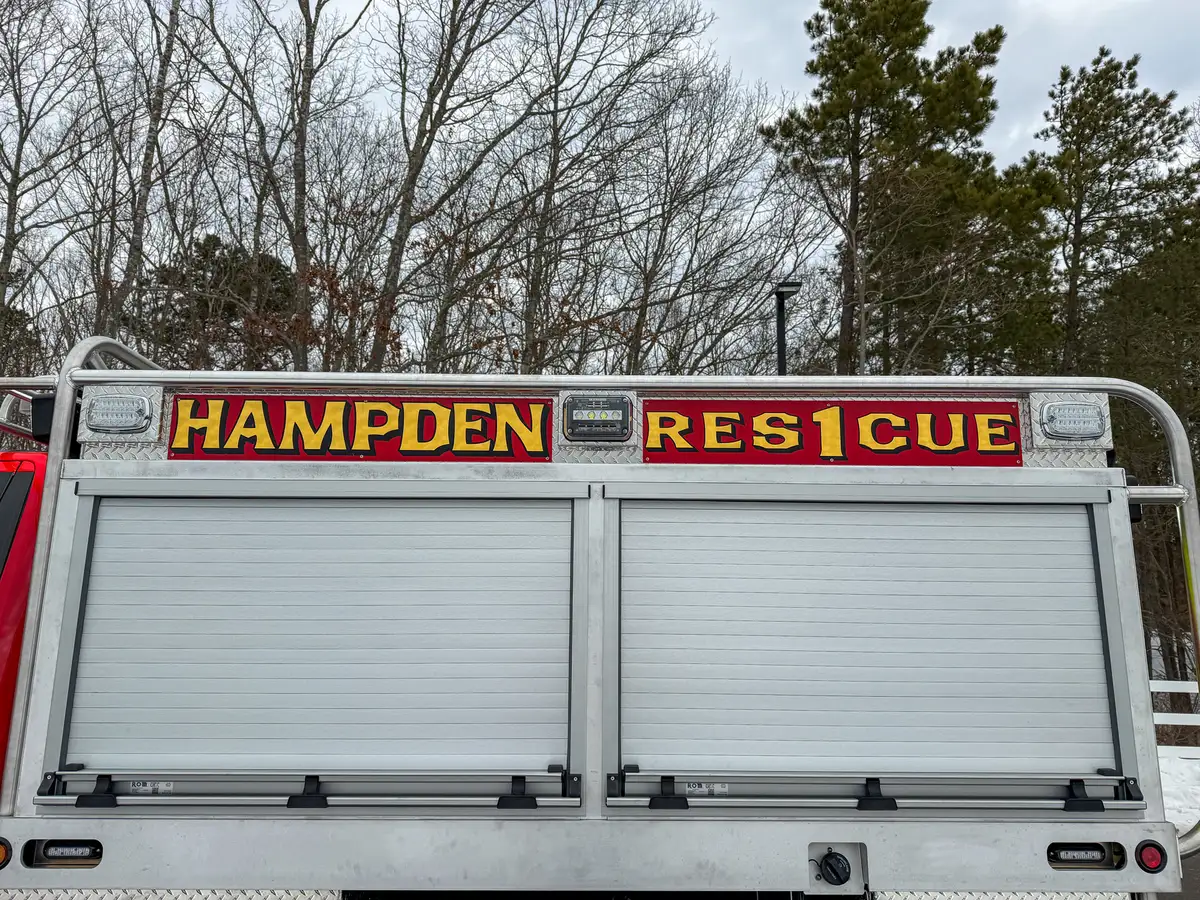 Upper side body panel with HAMPDEN RESCUE lettering.